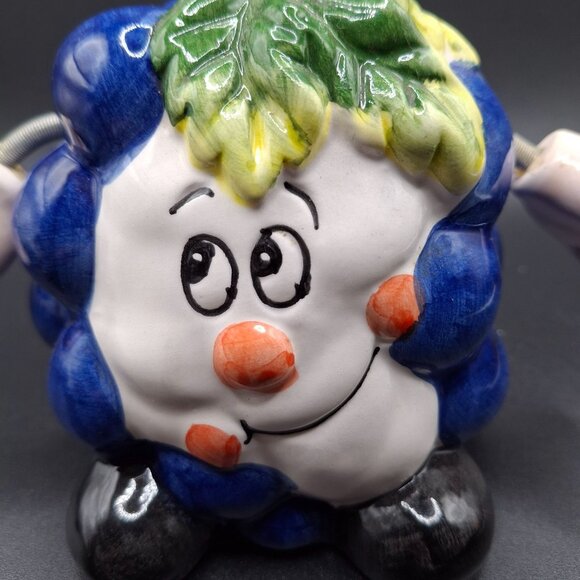 Vintage Ceramic Blue Grape-Shaped Coin Bank With Leaf Accent & Flexible Arms - Picture 2 of 5